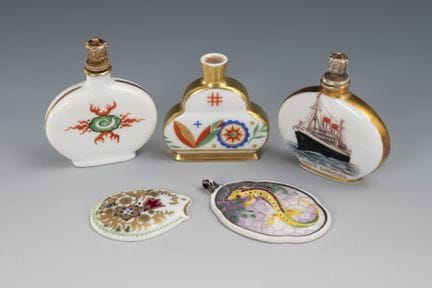 3 perfume bottles and 2 pendants.  
 

 
  
 

 Po