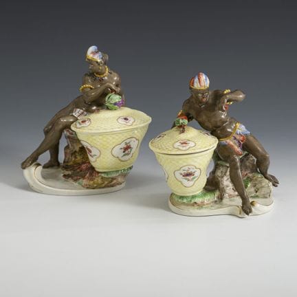 Pair of figurative saliers. Nymphenburg.  
 

 Emb