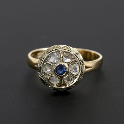 Ring mit rundem Ringkopf, blauem Farbstein und Dia