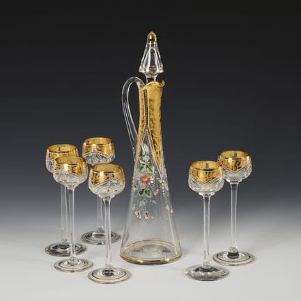 Caraffa con 6 bicchierini da liquore.  
 

 Prima 