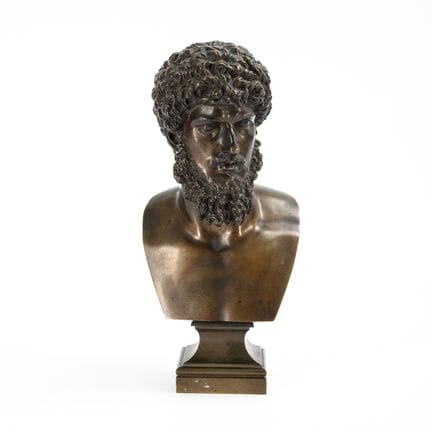 Bust of a man in an antique style 
 

 Patinated b