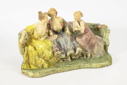 Gruppo di figure in stile Art Nouveau intente a sp