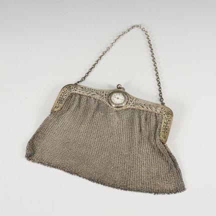 Rare Art Nouveau pouch with a ladies' watch.  
 

