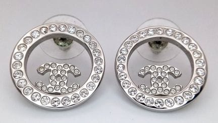 A Pair of Chanel Crystal Set CC Logo Earrings. Fea