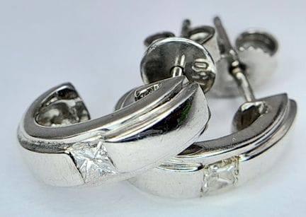 A PAIR OF 18K WHITE GOLD, DIAMOND SET, HALF HOOP E