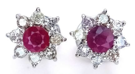 A PAIR OF 18K WHITE GOLD RUBY AND DIAMOND CLUSTER 