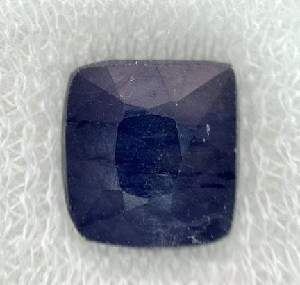 A 6.65ct Africa Origin Cushion cut Blue Sapphire. 