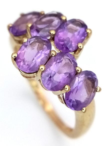 Bague « crossover » en or jaune 9 carats. Sertie d