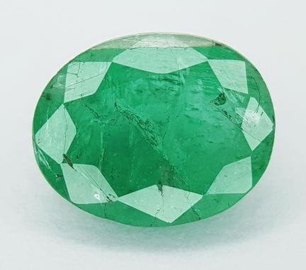 An IGI Certified 1.94ct Oval Mixed Cut Green Natur