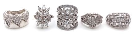 Cinque anelli in argento 925 con zirconi. Modello 