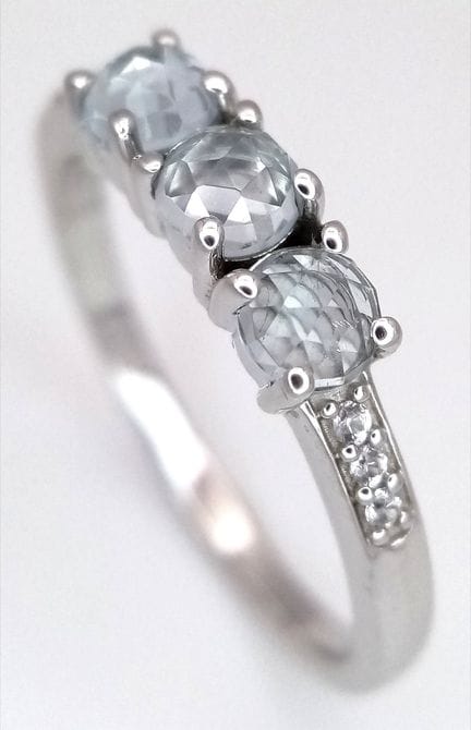 Jolie bague en argent sterling sertie de topazes b