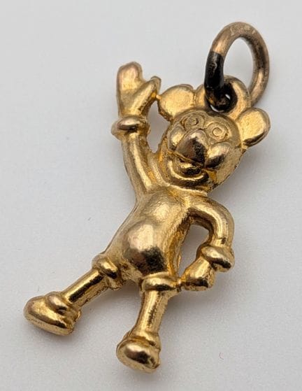 Un pendentif vintage Disney en or jaune 9 carats r