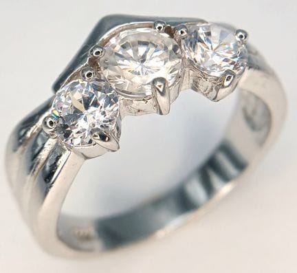 A Beautiful 925 Sterling Silver Three Stone CZ Set