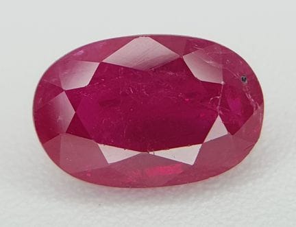 An IGI Certified 2.05ct Oval Mixed Cut Purplish Re