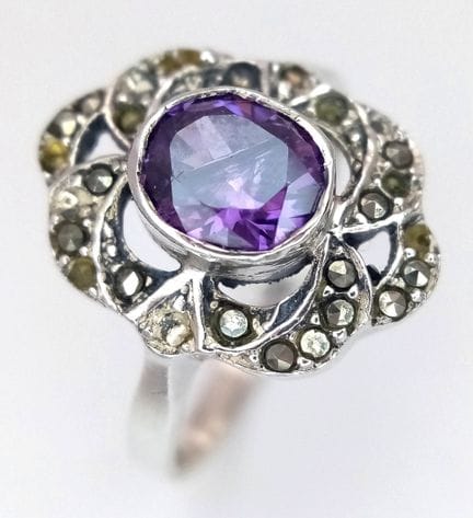 A STERLING SILVER, AMETHYST AND MARQUISITE SET, FL