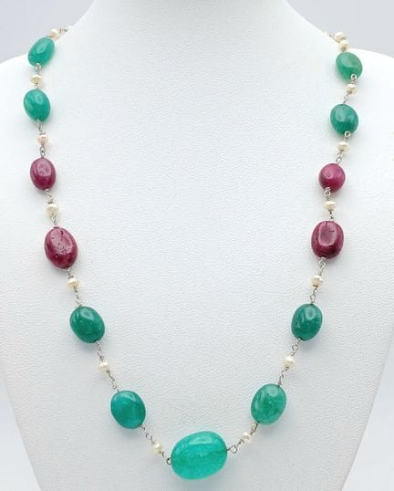 An Emerald and Ruby Gemstone Necklace with Pearls.