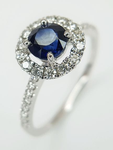 An 18K White Gold, Sapphire and Diamond Cocktail R