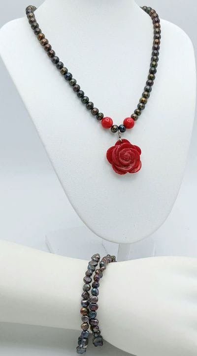 A Stunning Dark Freshwater Pearl Necklace and Two 