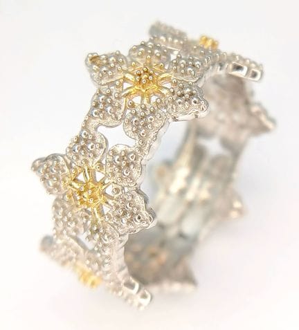 A Gold Gilded and Sterling Silver Two Tone Band Ri