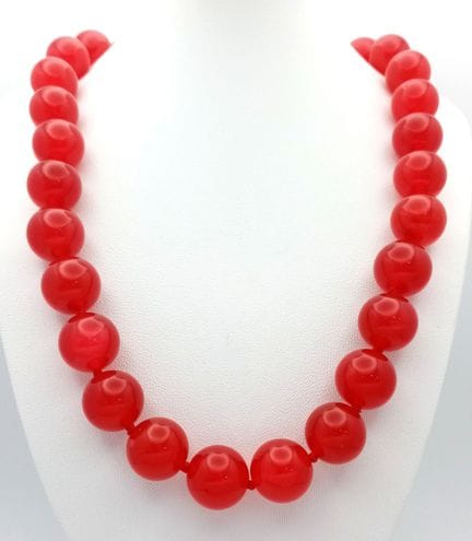 A Cherry Red Jade Beaded Necklace. 14mm beads. 44c