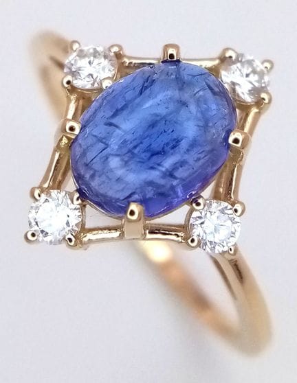 A 14K Yellow Gold Natural Tanzanite and Diamond Co