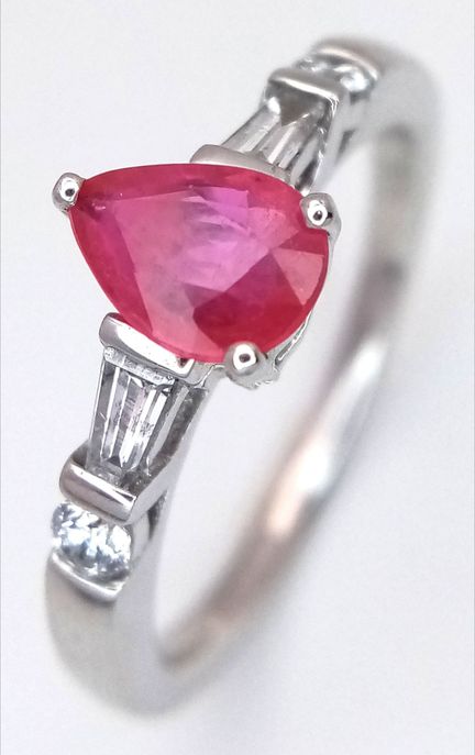 A 950 Platinum, Ruby and Diamond Ring. A centre 0.