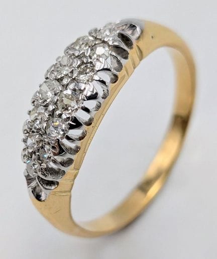An 18K Yellow Gold (tests as) Diamond Cluster Ring