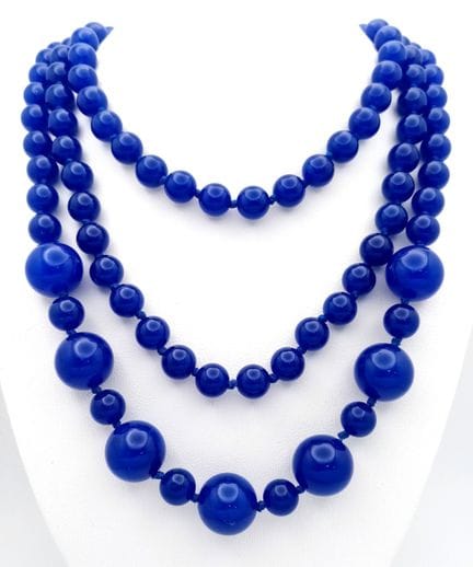 A Blue Jade Rope Length Necklace. Beads of 6-14mm.