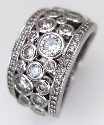 A STERLING SILVER, STONE SET, BAND RING. 8.3G, SIZ