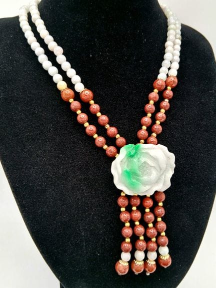 A Beautiful Multi-Strand White and Red Agate Beade