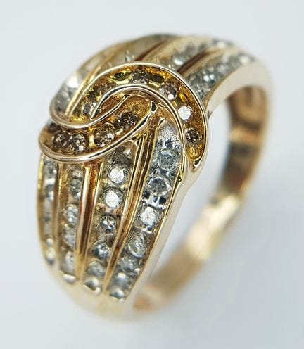 A 9K Yellow Gold, Fancy Diamond Set, 4 Row Ring. 0