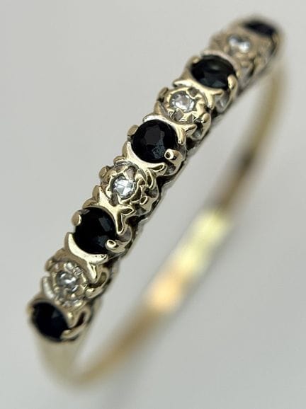 A 9K YELLOW GOLD, DIAMOND AND SAPPHIRE, HALF ETERN