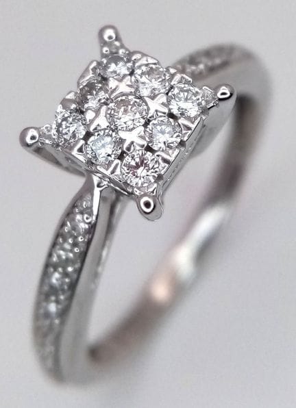 A 9K White Gold, Diamond Set Ring. 0.20ctw. 2.4g, 