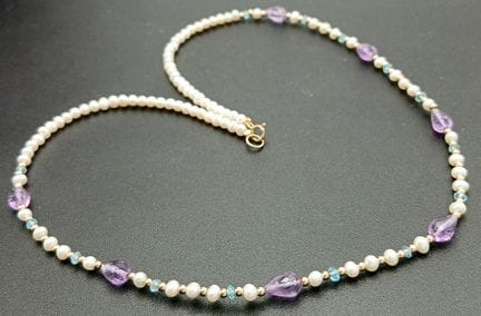 A Cultured Pearl, Amethyst and Aquamarine Necklace