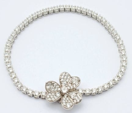 A 925 Sterling Silver White Stone Set Flower Tenni