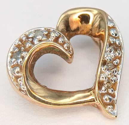 A 9k Yellow Gold Diamond Set Heart Pendant. 1.2cm 