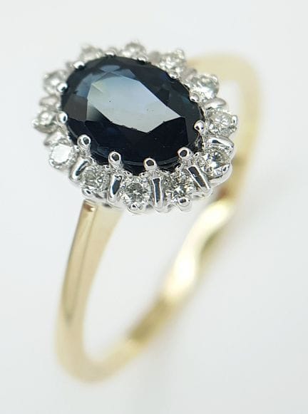 An 18K Sapphire and Diamond Cocktail Ring. A 0.50c