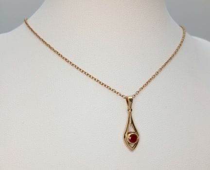A Hallmarked 1998, 9k Yellow Gold and Ruby Set Pen