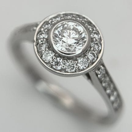 An 18K White Gold, Diamond Solitaire Ring with a H
