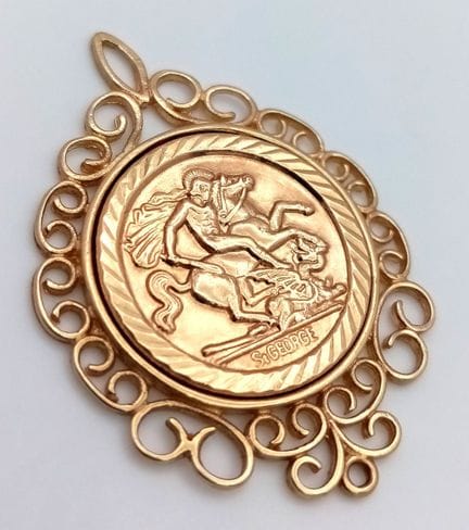 A 9k yellow gold St. George pendant, 2.5g total we