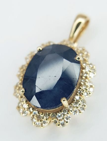 A 14K Yellow Gold Natural Sapphire and Diamond Pen