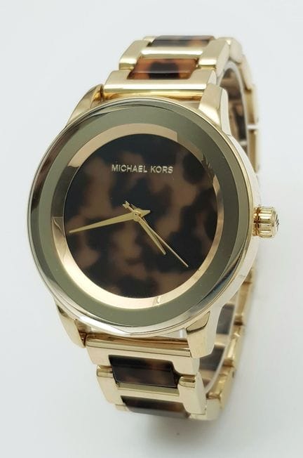 A MICHAEL KORS, GOLD TONE AND TORTOISE SHELL EFFEC