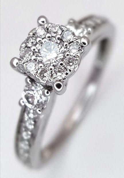 An 18K White Gold and Diamond Cluster Ring. Circa 