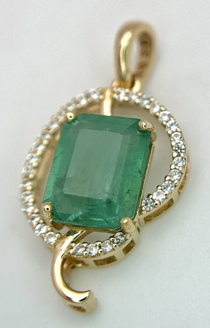 A 14K Yellow Gold Natural Emerald and White Sapphi