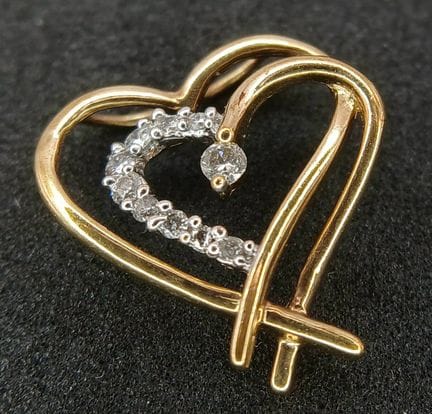 A 9K Yellow Gold, Double Heart and Diamond Pendant