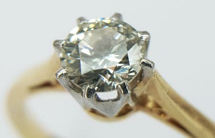 Anello solitario in oro giallo 18 carati e platino