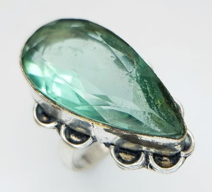 A 925 Sterling Silver Green Stone Dress Ring. The 