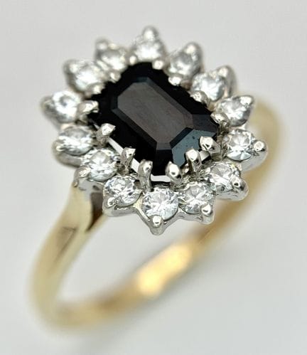 Anillo de oro de 9 quilates con zafiros y un racim