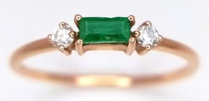 A 14K ROSE GOLD, DIAMOND AND EMERALD, 3 STONE RING
