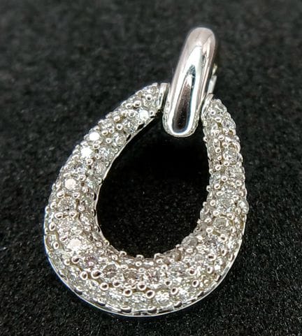 An 18K White Gold and Diamond Cluster Pear-Shaped 